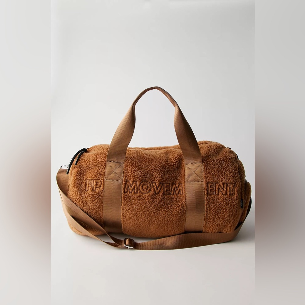 A14. NWOT Free People Cozy Up Duffle Bag